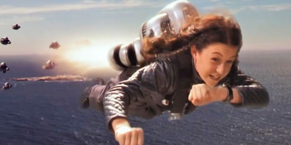An image of Carmen flying through the sky with a BuddyPack in Spy Kids