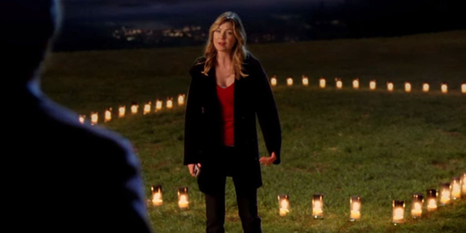 An image of Meredith standing in front of a house of candles in Grey's Anatomy