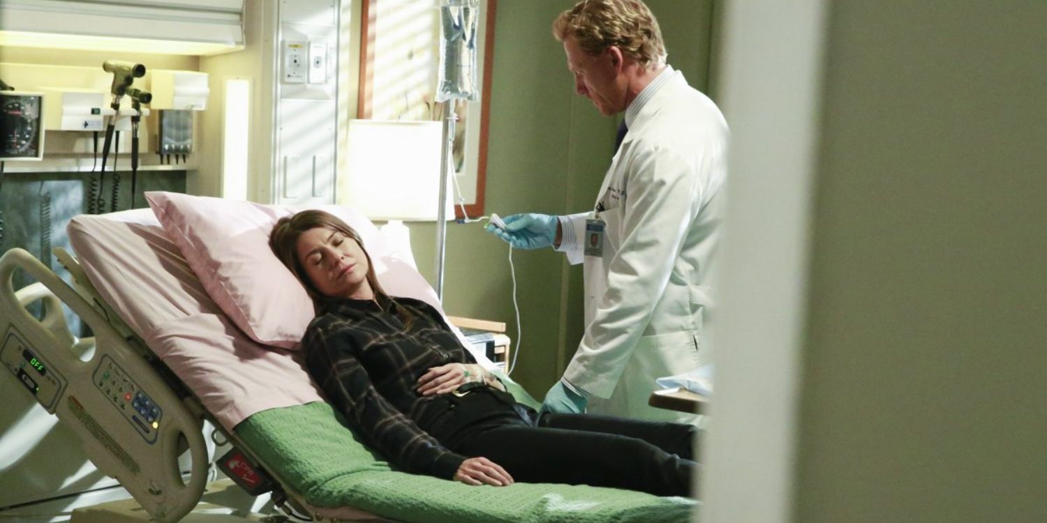 An image of Owen treating Meredith after she fainted from shock in Grey's Anatomy