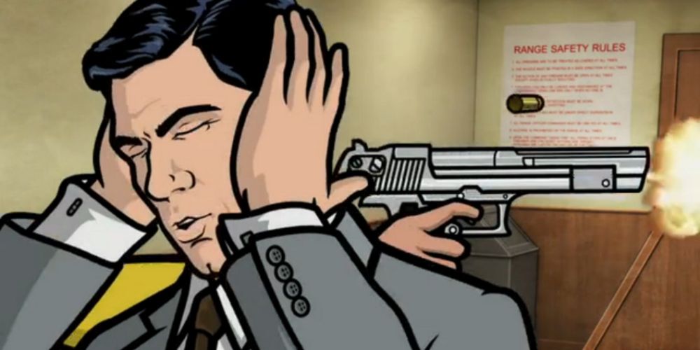 A gun is fired next to Archer's head.