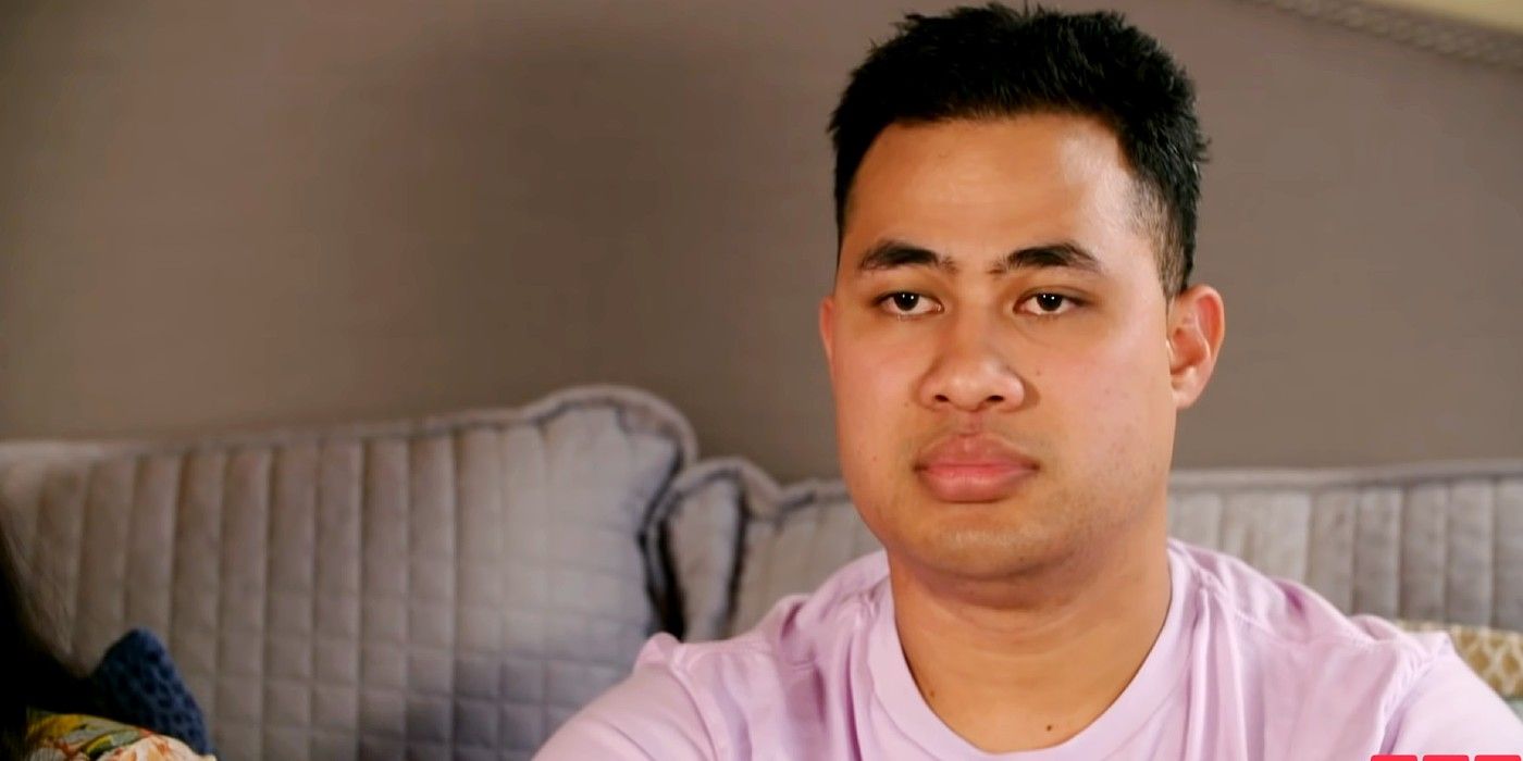 Asuelu Pulaa in 90 Day Fiance looking bored and unamused 