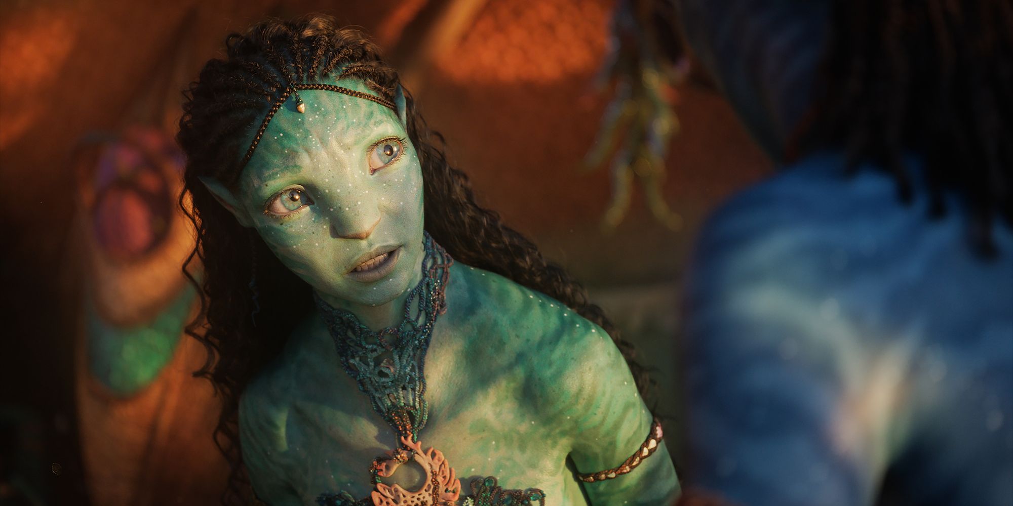 Bailey Bass as Reya in Avatar: The Way of Water looking worried.