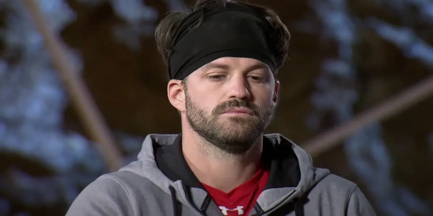 Johnny Bananas looking serious wearing hat and red shirt The Challenge