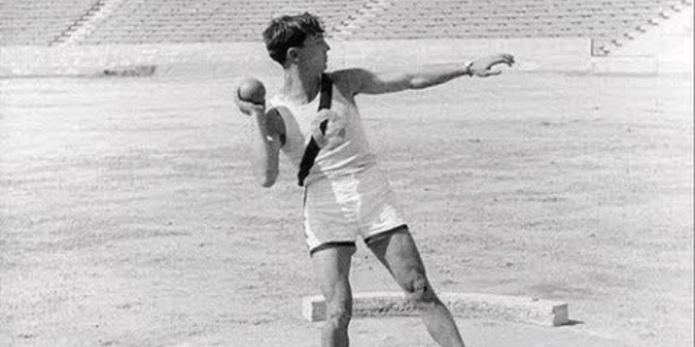 Buster Keaton holding a shot put ball in College 