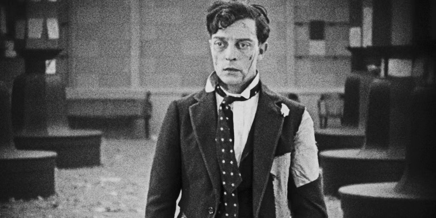 Buster Keaton standing in torn clothes in The Saphead