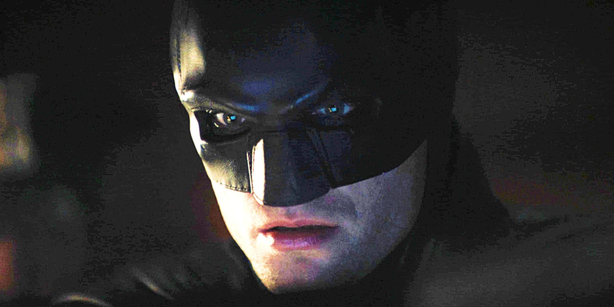 Close up of Robert Pattinson's Batman wearing mask in The Batman