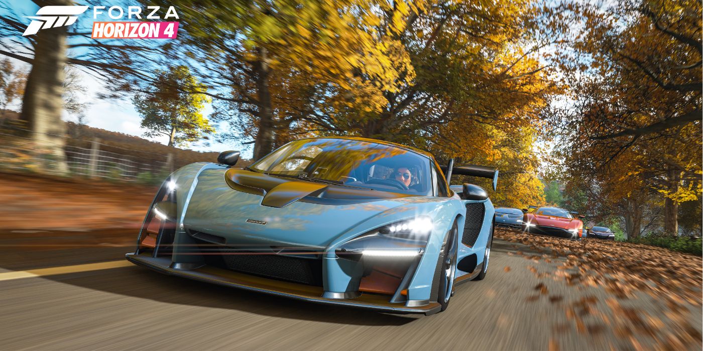 Carros correndo sob árvores outonais no Forza Horizon 4.