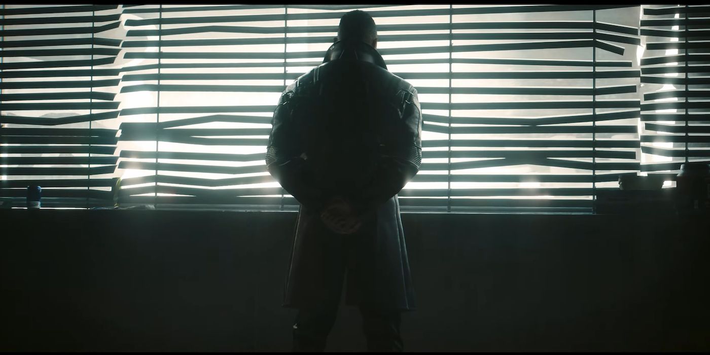 Idris Elba as Solomon Reed in Cyberpunk 2077: Phantom Liberty, looking out of a window with broken blinds.