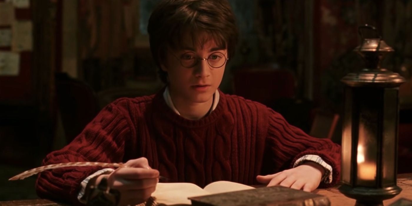 Daniel Radcliffe as Harry Potter with Quill Pen and Tom Riddle's Diary in Harry Potter and the Chamber of Secrets