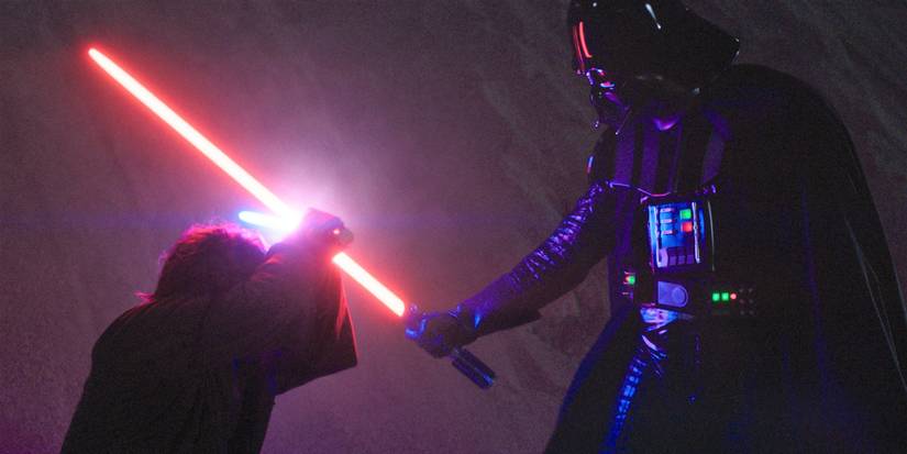 Darth Vader and Obi-Wan Kenobi clashing lightsabers in the Obi-Wan Kenobi show with Obi-Wan kneeling in front of Darth Vader
