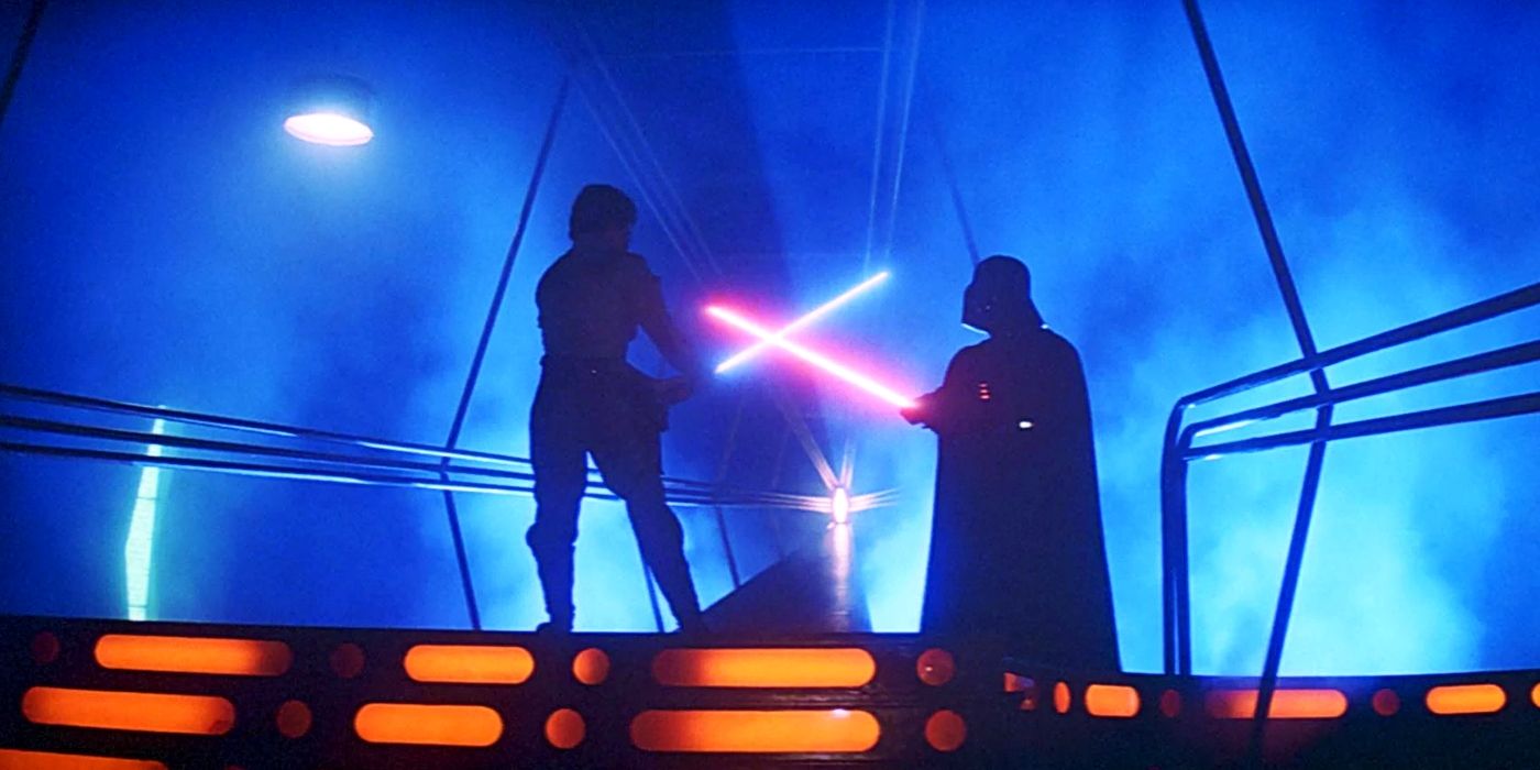 Luke and Vader in a lightsaber dual in Star Wars: The Empire Strikes Back.