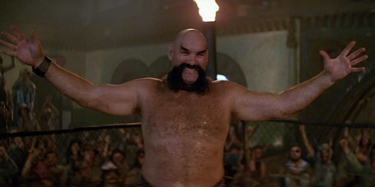 Ox Baker spreads his arms wide in Escape from New York 