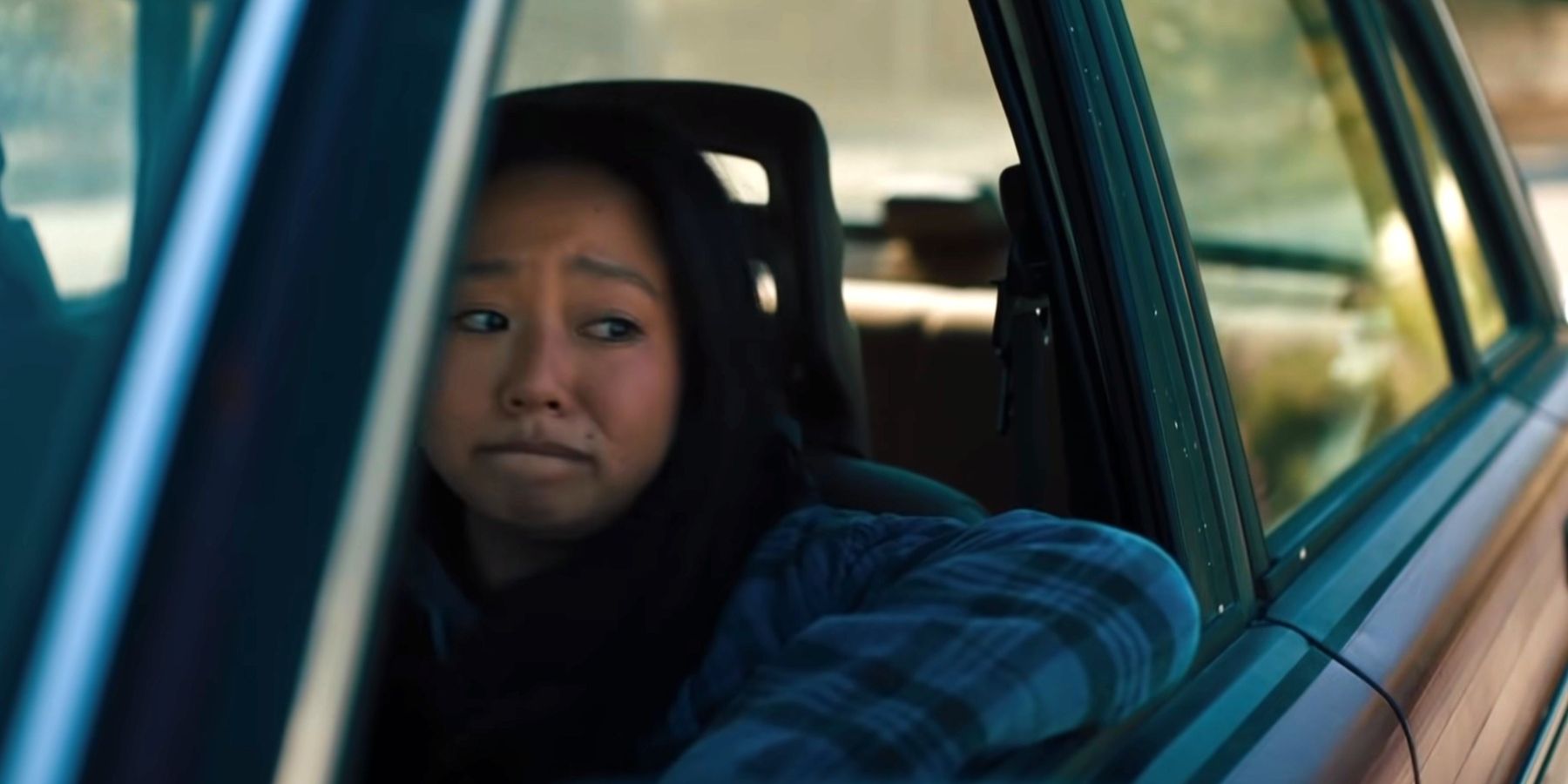 Joy Wang driving her car in Everything Everywhere All At Once
