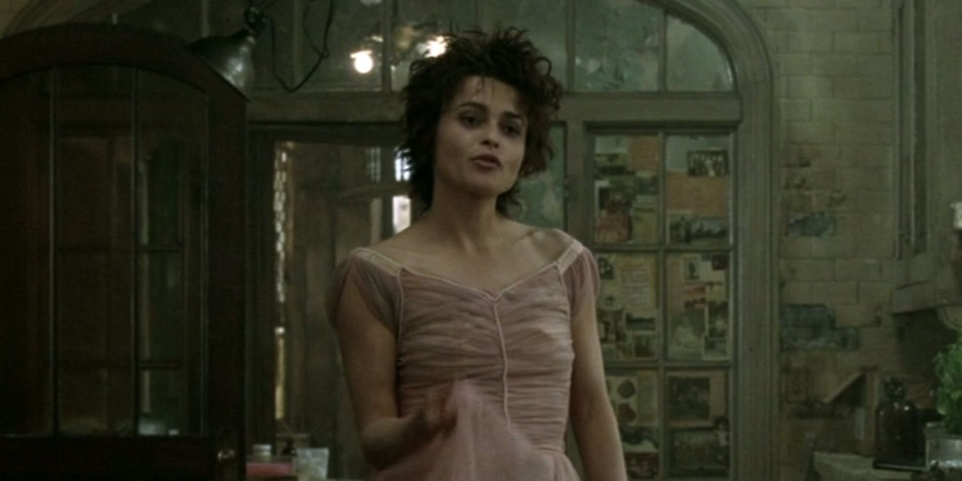 Marla holding up a $1 bridesmaid dress in Fight Club