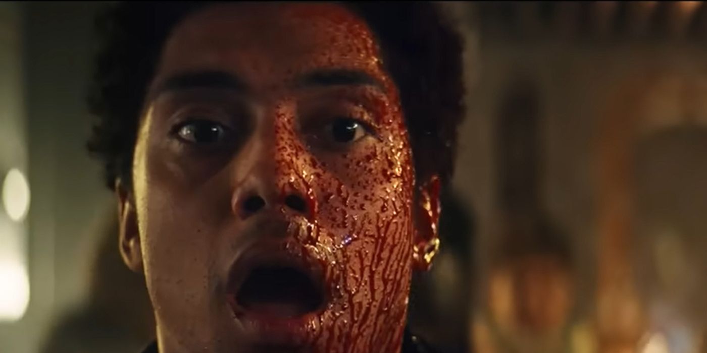 A young man, mouth agape covered in blood in Gen V.