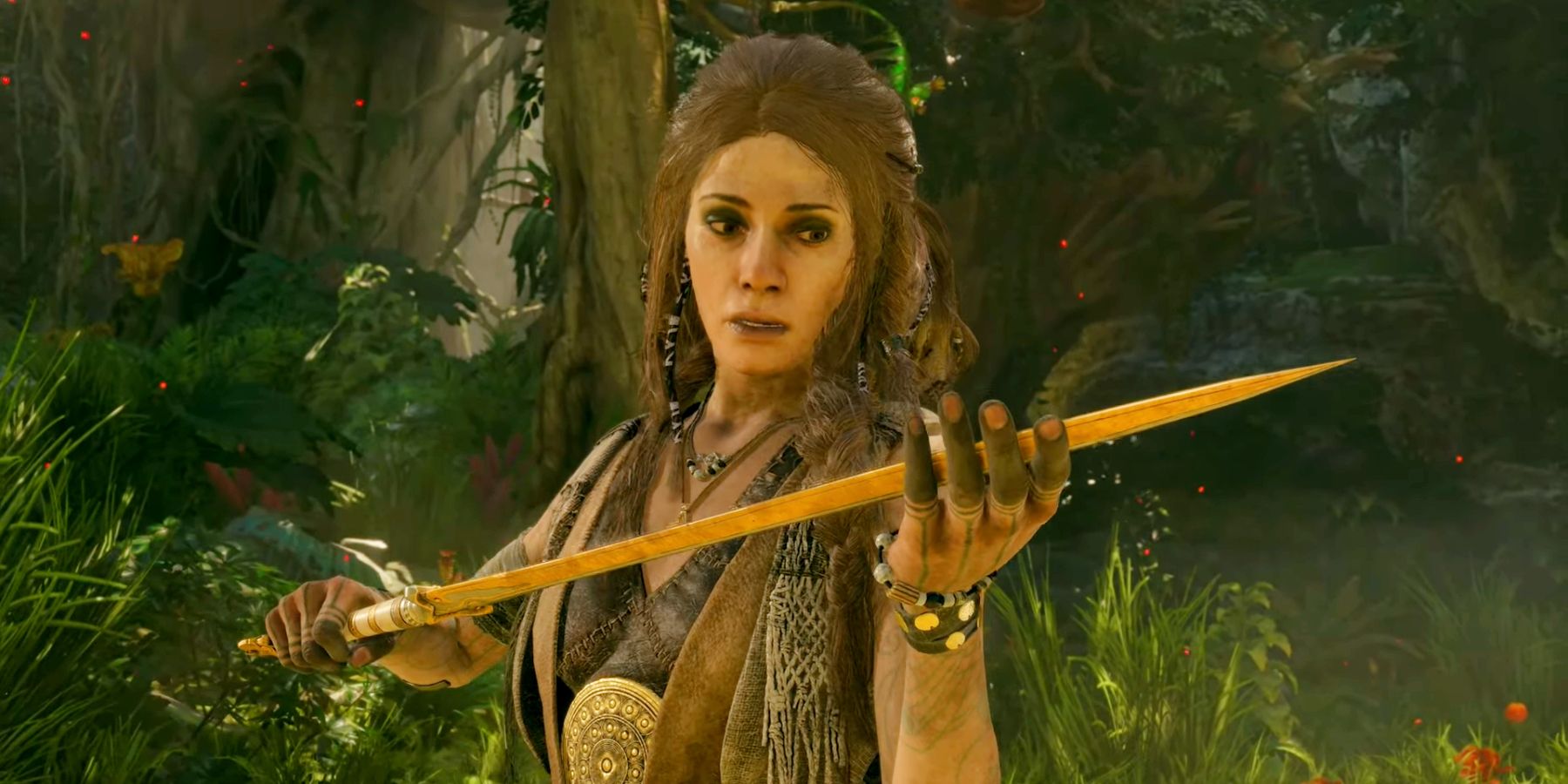 Freya holding the Mardoll Sword after she pulls it from a stump in God of War Ragnarok.