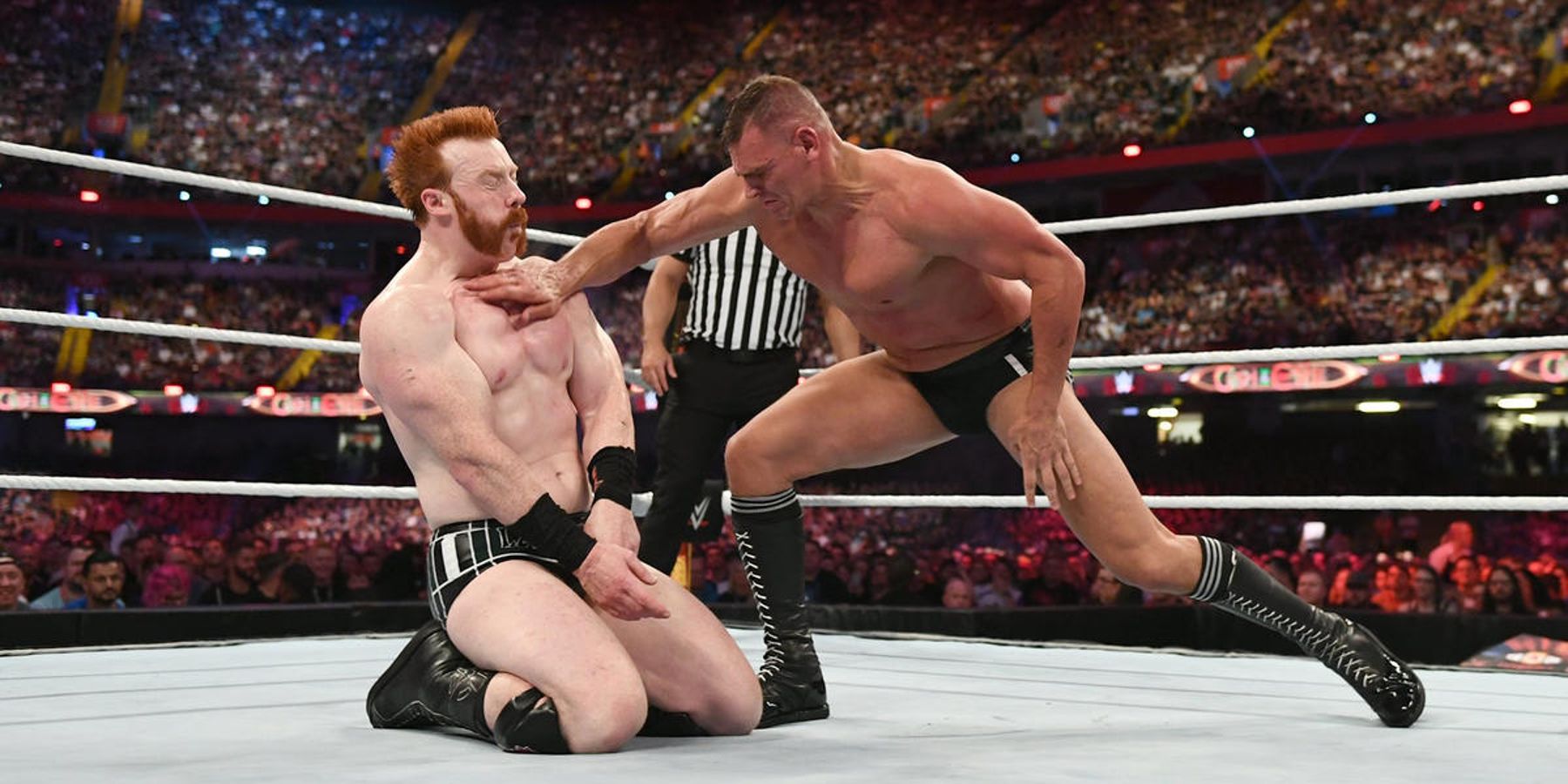 Gunther lays a hard chop on Sheamus during their match at WWE Clash At The Castle in 2022.