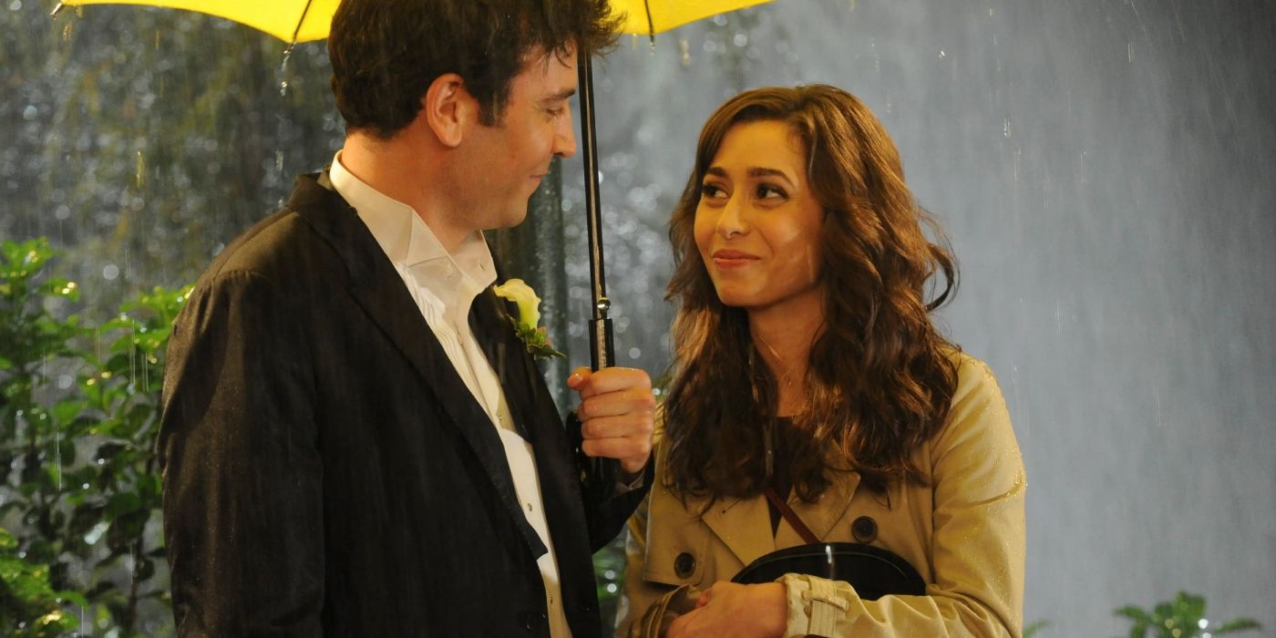 Ted y Tracy sonriéndose con un paraguas amarillo en Cómo conocí a vuestra madre
