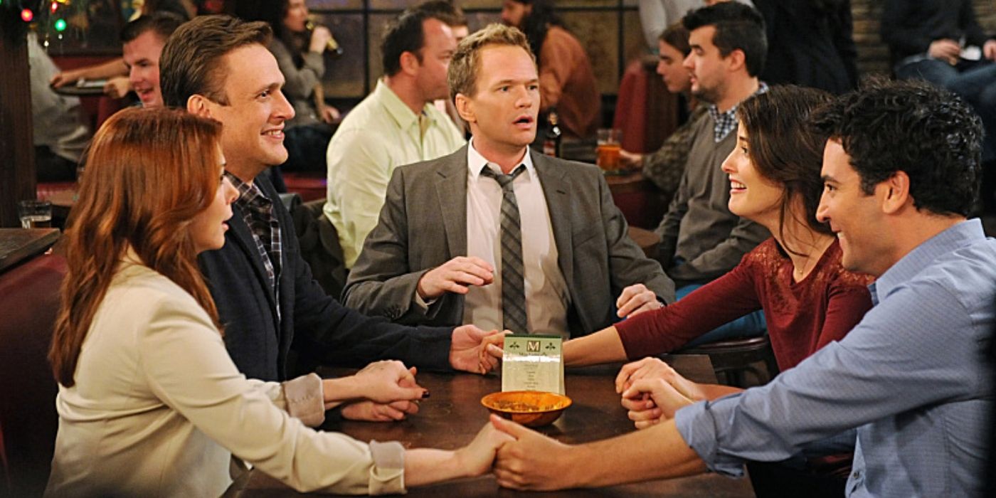 Lily, Marshall, Barney, Robin and Ted at the bar in How I Met Your Mother
