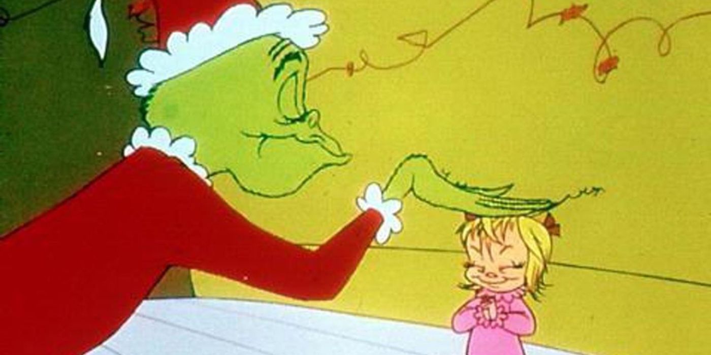 The Grinch and a little girl In How The Grinch Stole Christmas (1966)