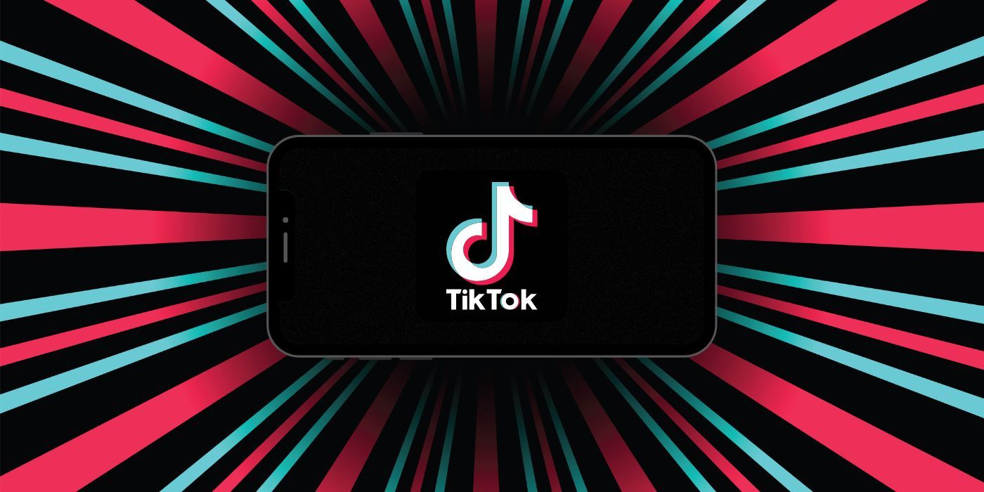 Telefone exibindo o ícone do TikTok no modo de tela cheia, em um plano de fundo com linhas em estilo vórtice em vermelho neon e azul