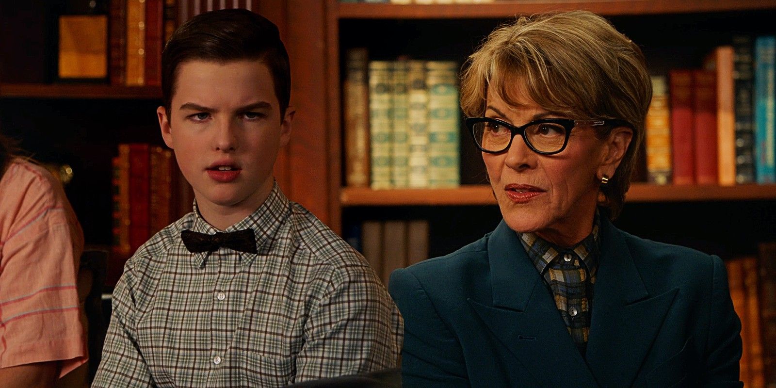 Iain Armitage as Sheldon and Wendie Malick as President Hagemeyer in Young Sheldon season 6