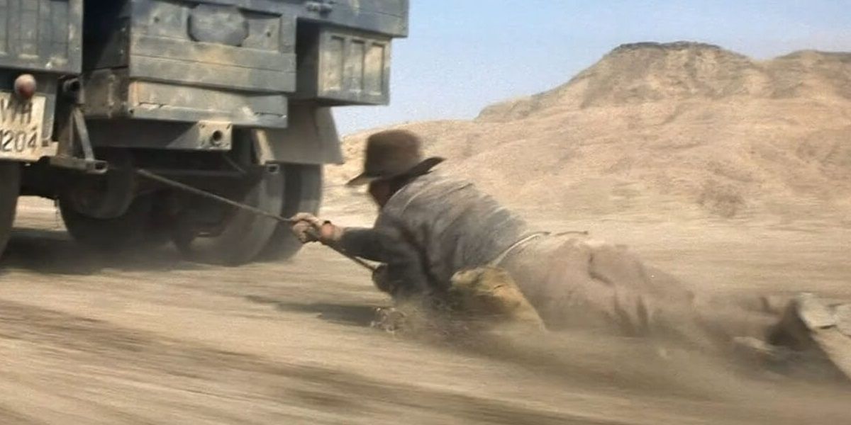 Indy_hangs_from_a_truck_in_Raiders_of_the_Lost_Ark