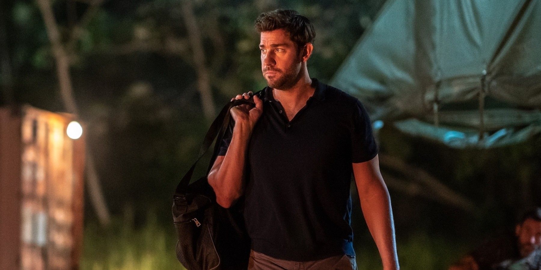 Jack Ryan walking with his bag.