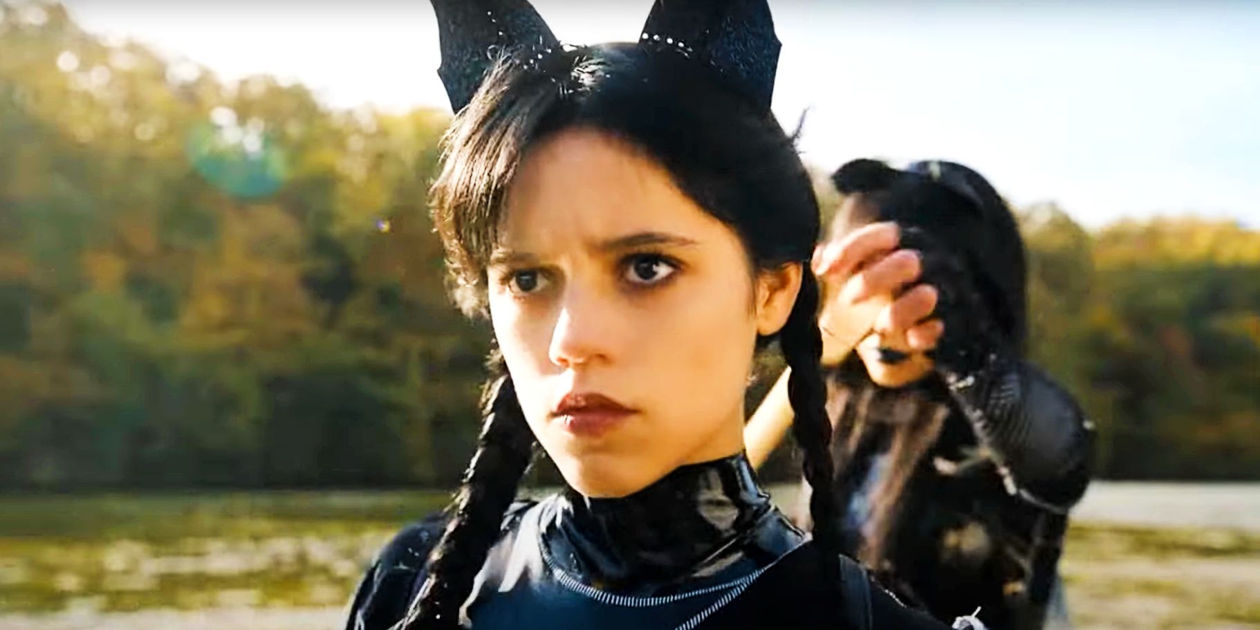 Jenna Ortega as Wednesday Addams wearing catsuit and rowing in Wednesday
