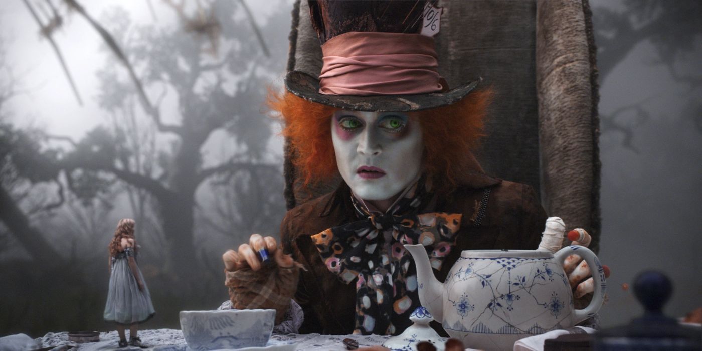 Johnny Depp pouring tea in Alice in Wonderland directed by Tim Burton