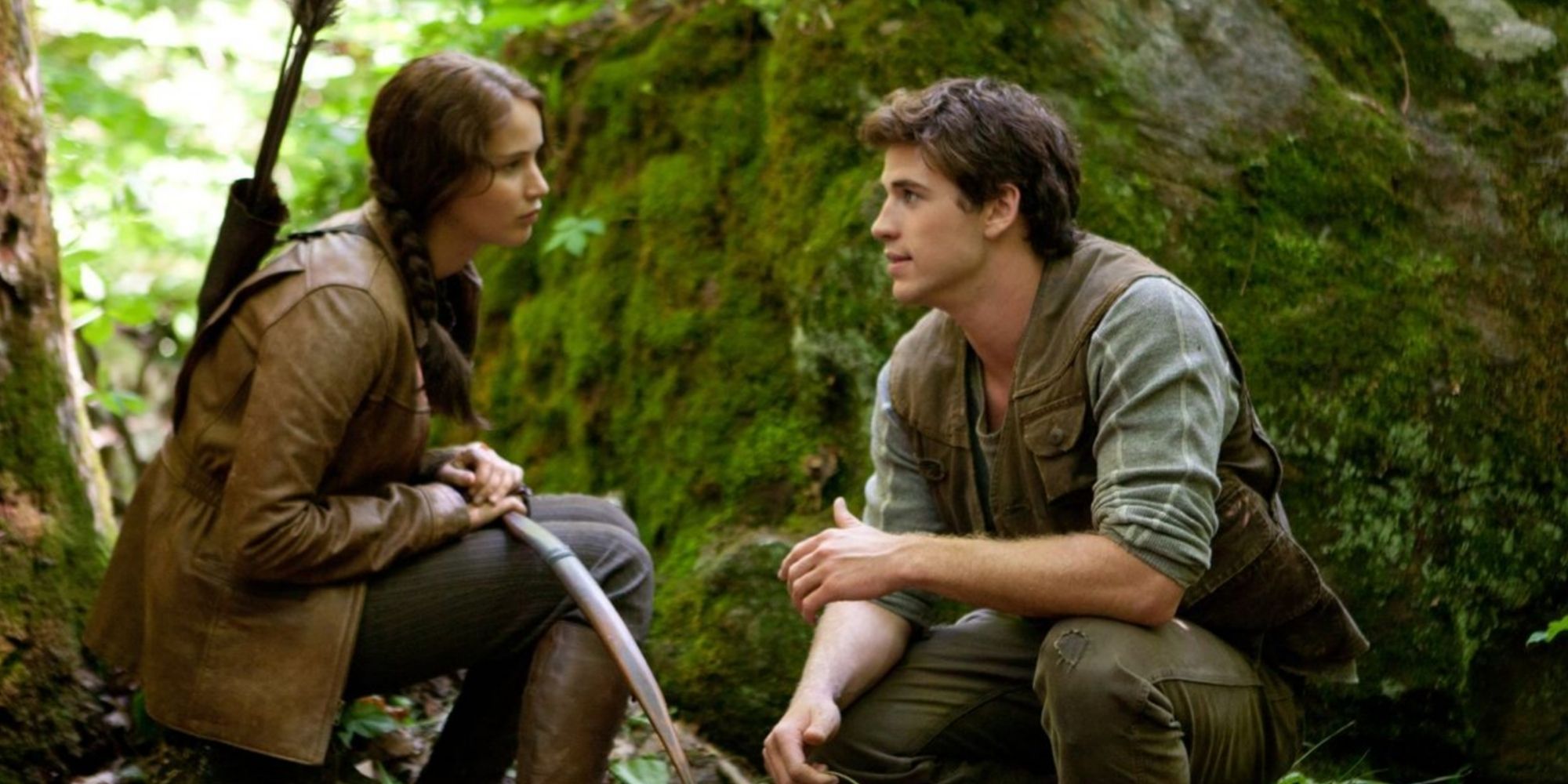 Katniss and Gale in the forest in The Hunger Games