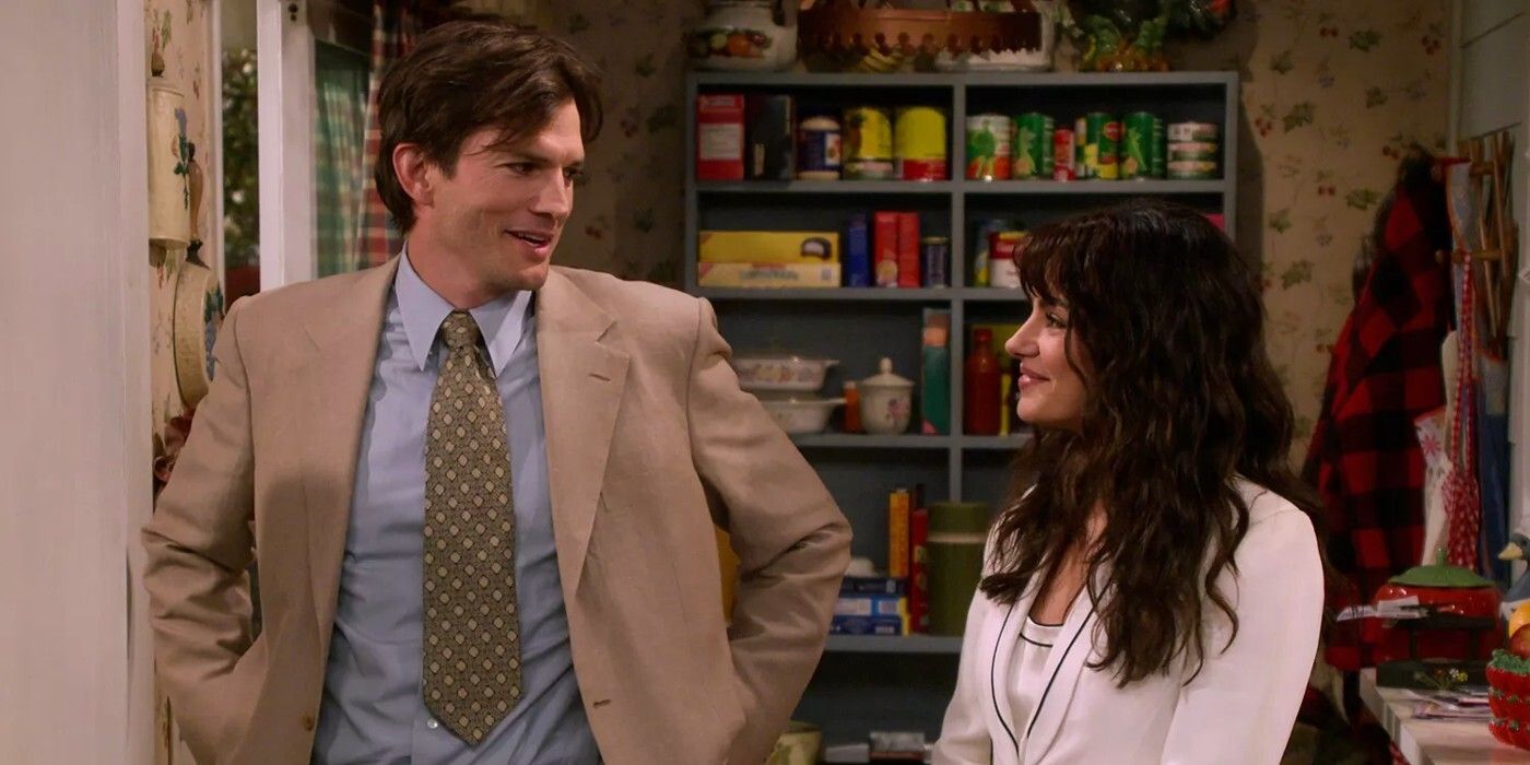 Michael and Jackie Kelso smiling at one another in That 90s Show