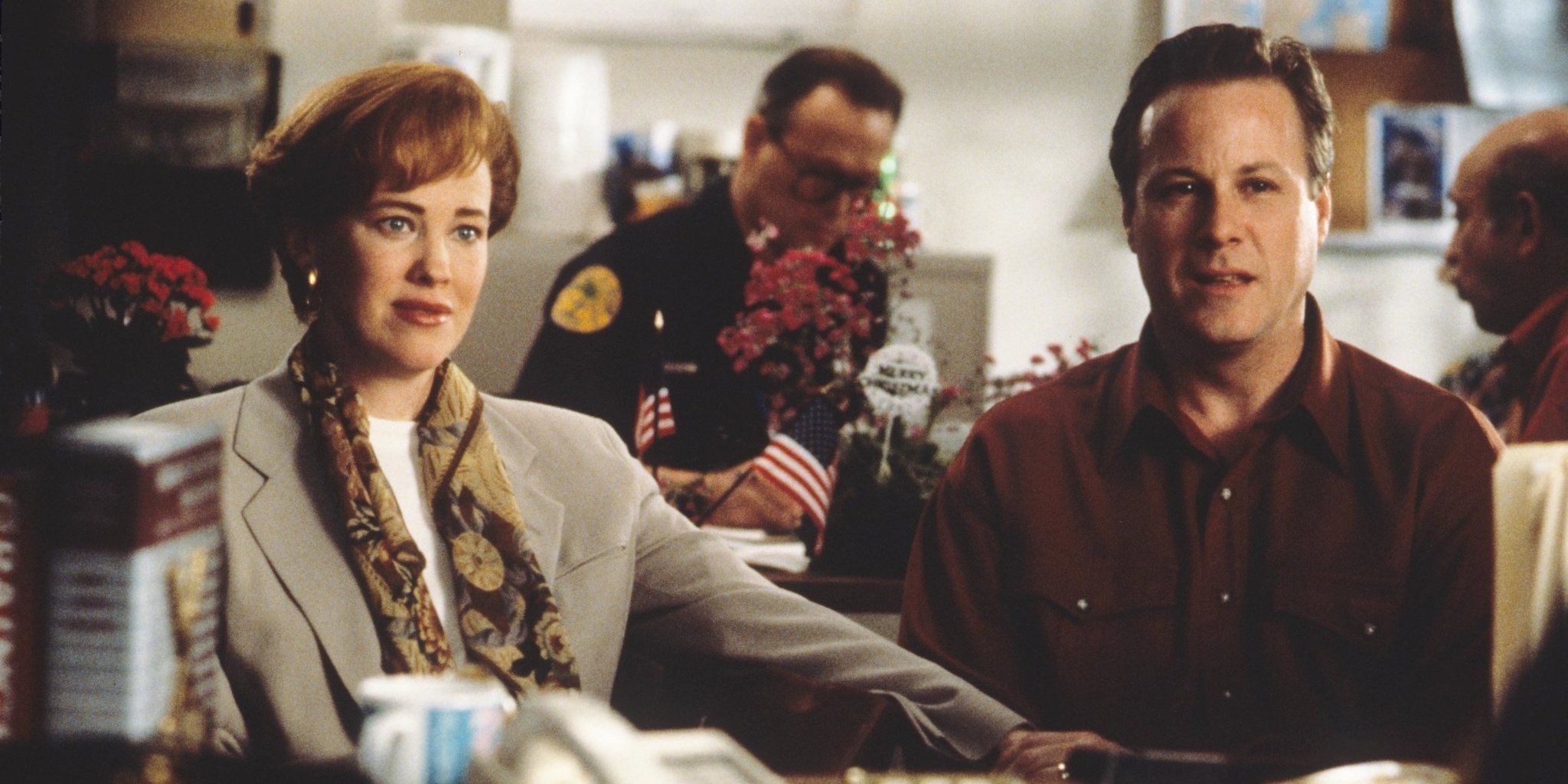 Kevin's parents at the police station in Home Alone 2