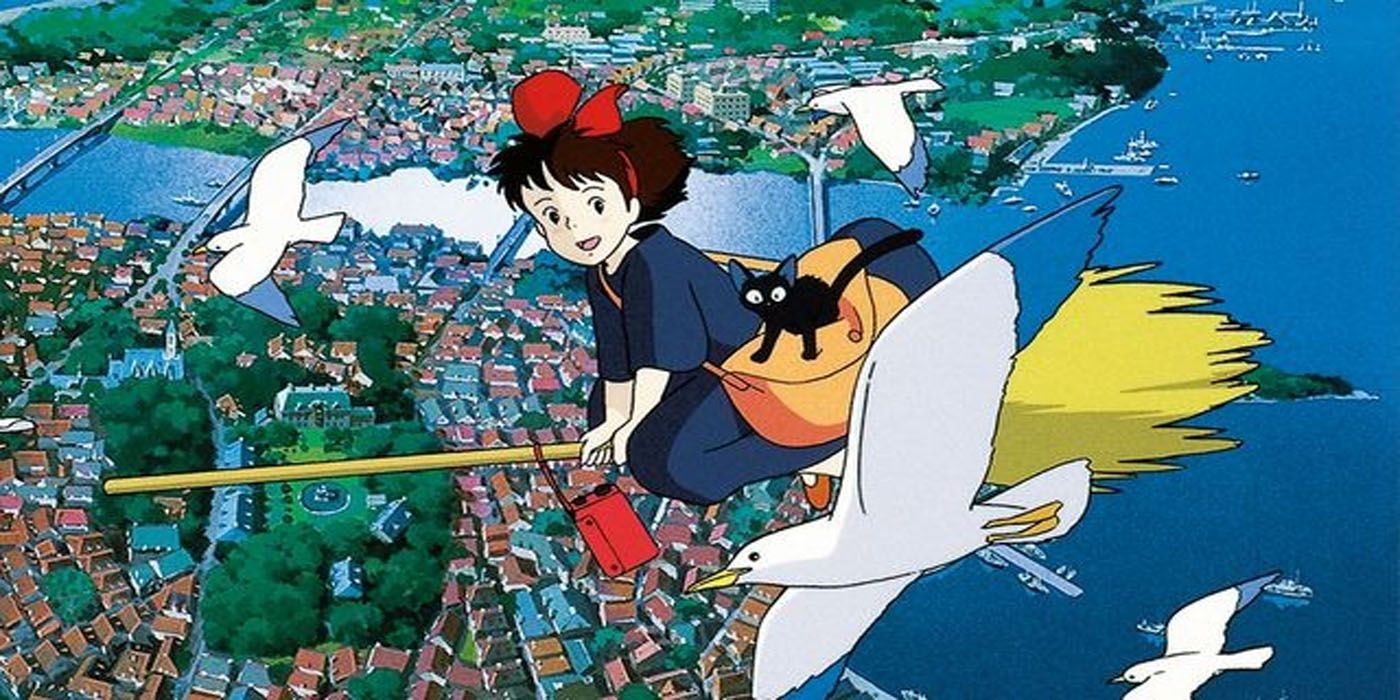 Kiki flying on her broom with Jiji the cat amongst Seagulls in Kikis Delivery Service