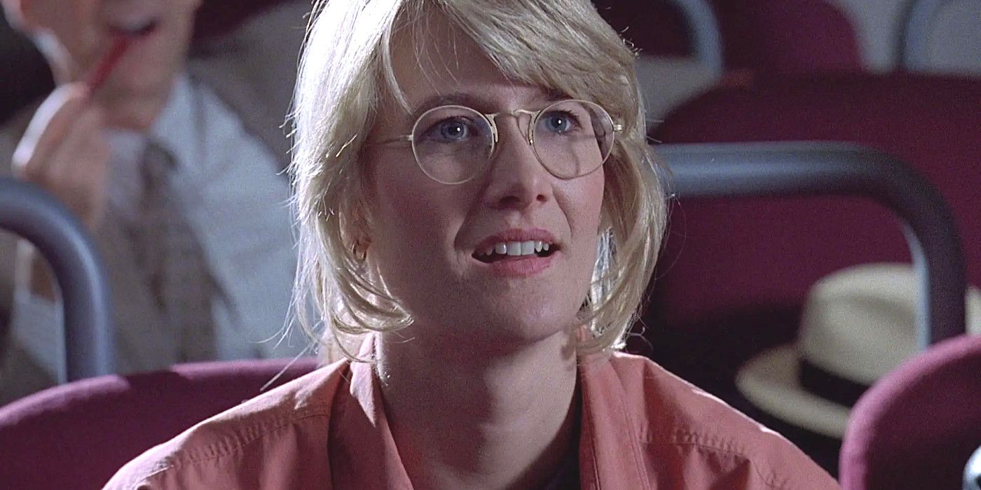 Laura Dern as Ellie in Jurassic Park wearing glasses during a meeting