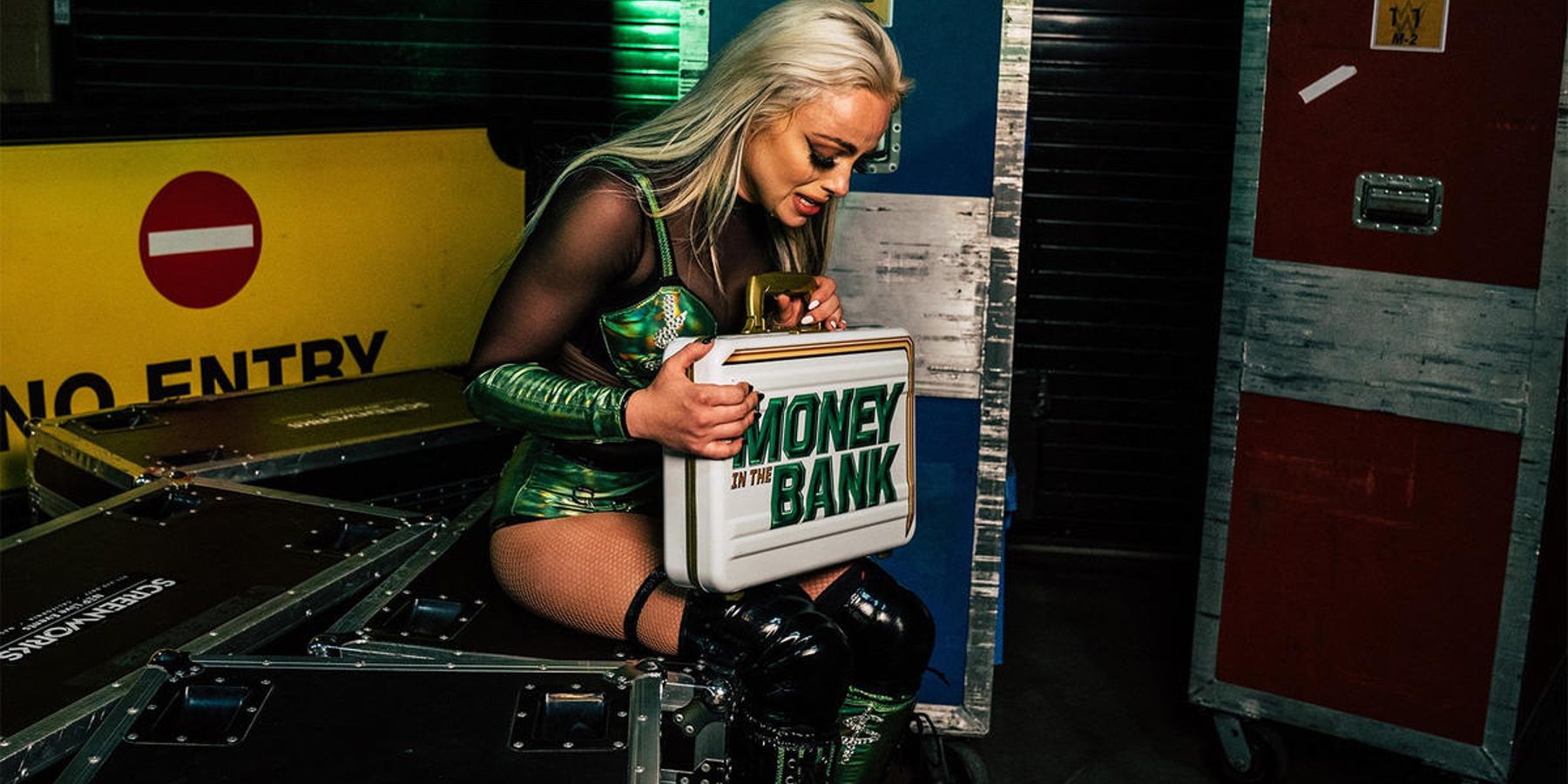 Liv Morgan celebrates her win in the women's Money In The Bank match in WWE.