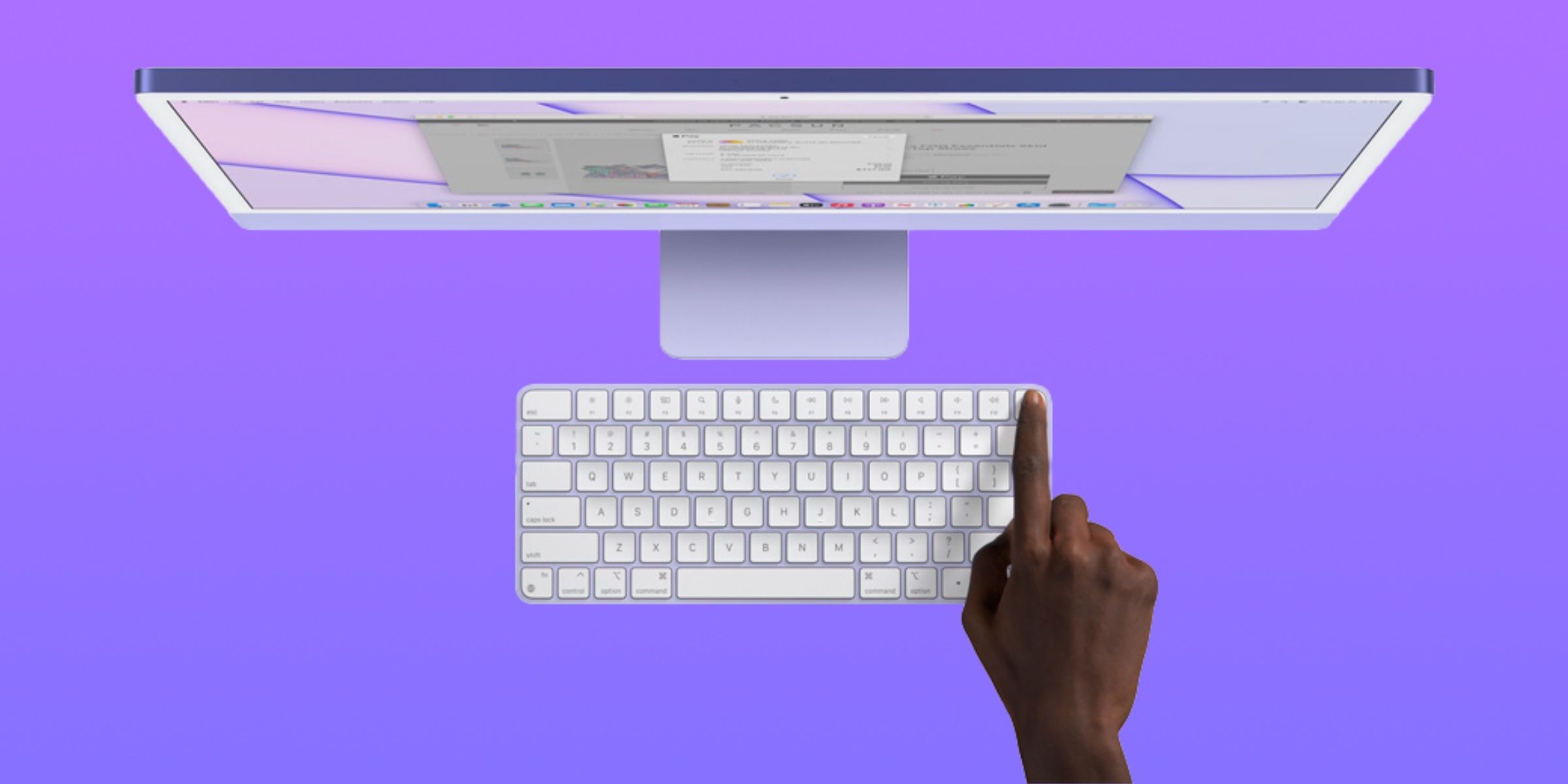 Ein Magic Keyboard mit Touch ID, das an einen iMac M1 angeschlossen ist.