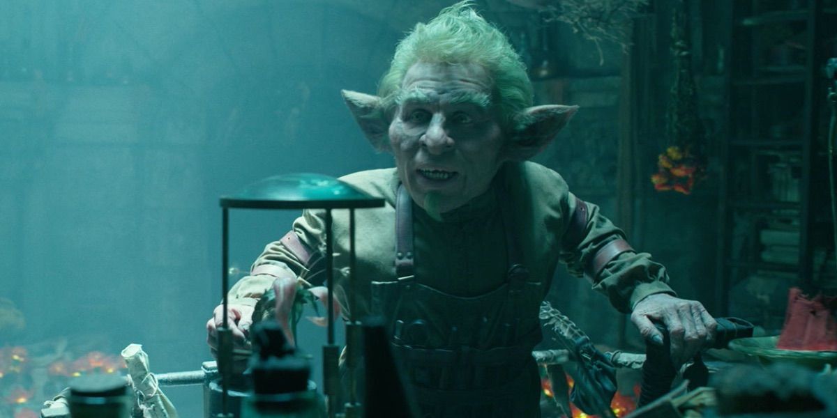 Lickspittle looks up from his scientific instruments in Maleficent Mistress of Evil