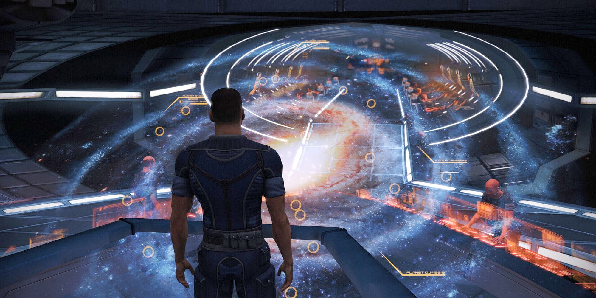 Image of Commander Shepard on the bridge of the Normandy SR-1 viewing the holographic galaxy map.