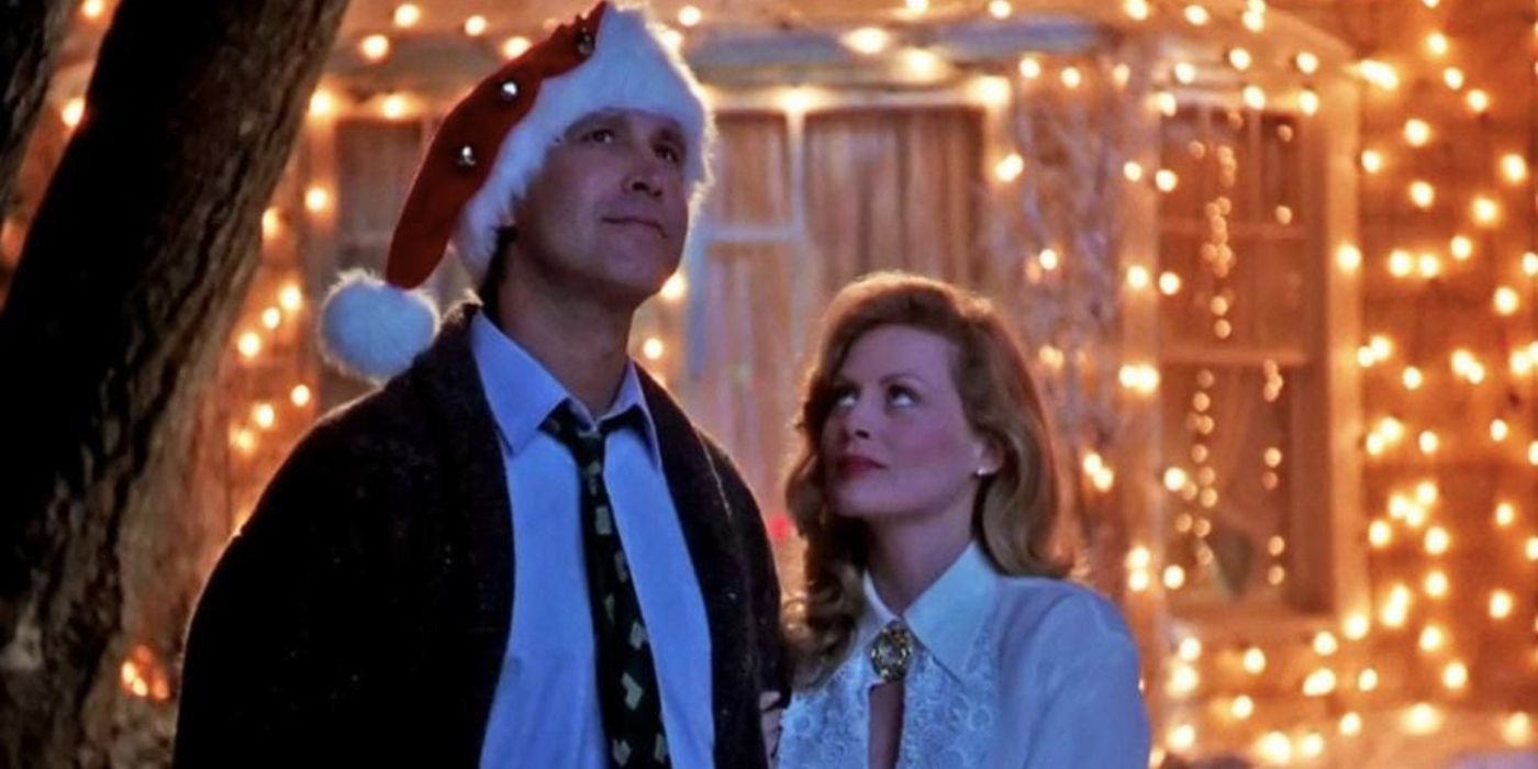 Clark and Beverly standing in front of Christmas Lights in Christmas Vacation