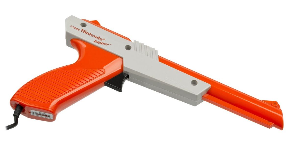 The orange and grey Nintendo Zapper on a white background 