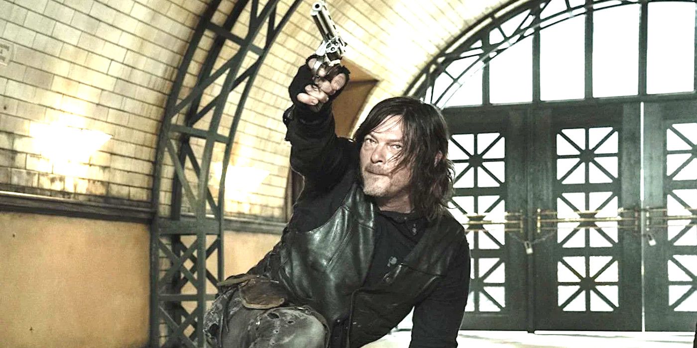 Norman Reedus as Daryl Dixon in The Walking Dead doing a cool pose while pointing a big gun