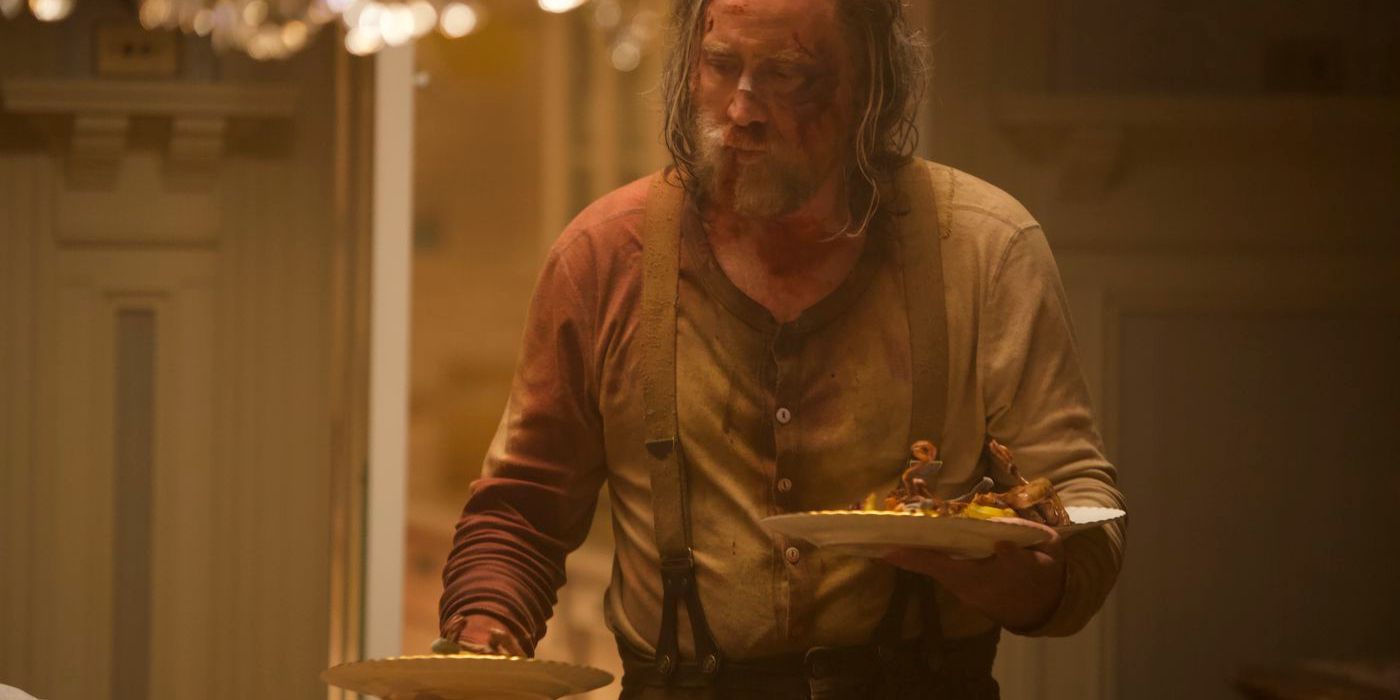 Nicolas Cage walks in with two plates in Pig