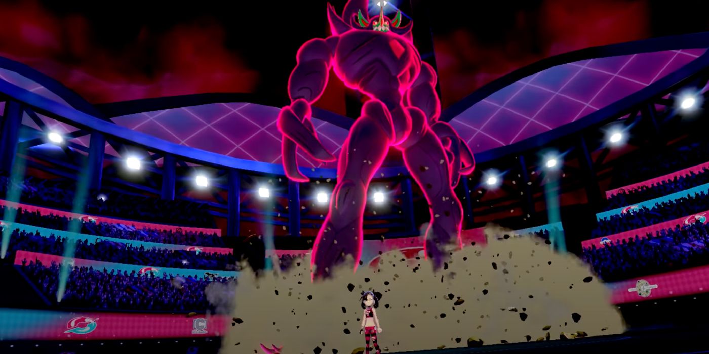 Image of Marnie in Pokémon Sword and Shield in front of a Gigantamaxing Grimmsnarl.