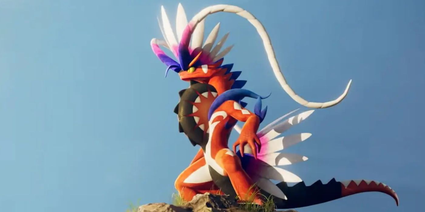 Koraidon posing over a cliff in Pokémon Scarlet and Violet.