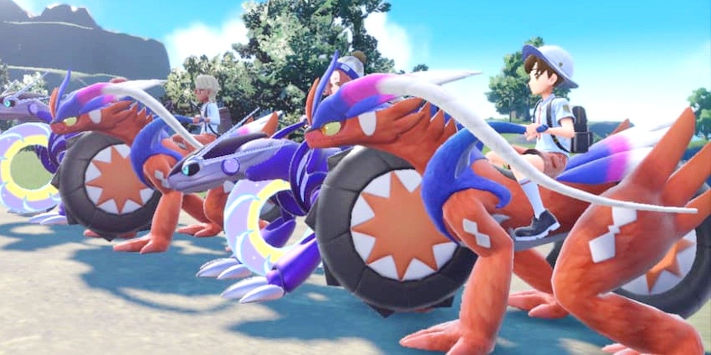 Les joueurs de Pokémon Scarlet et Violet alignés sur leurs vélos légendaires, prêts à courir