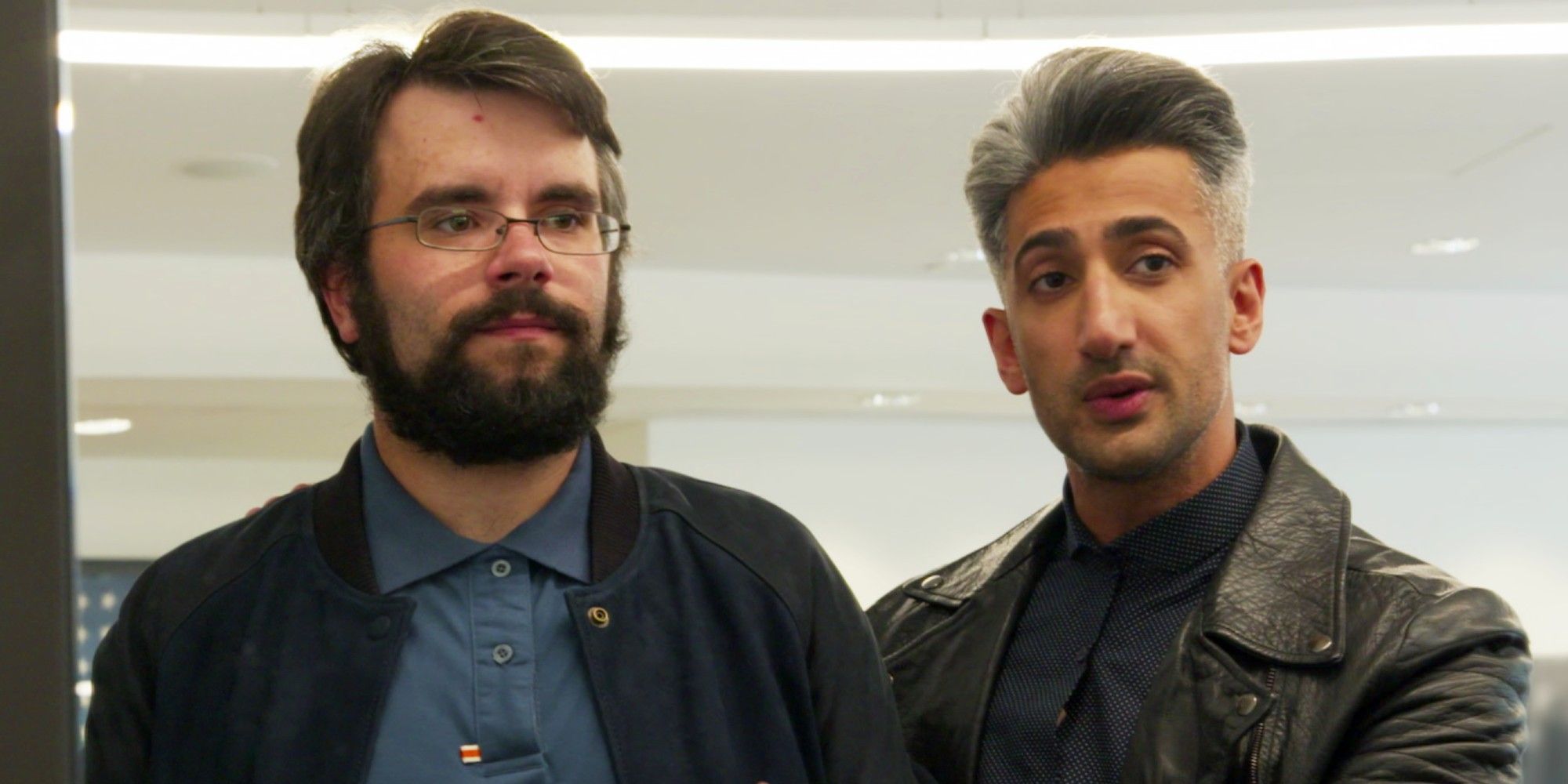 Joe Gallois and Tan France look at a mirror in Netflix's Queer Eye.