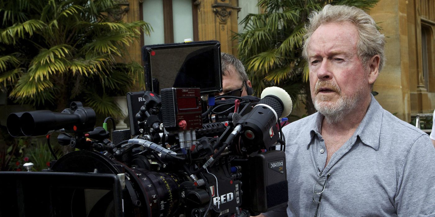 Ridley Scott behind a camera shooting House of Gucci