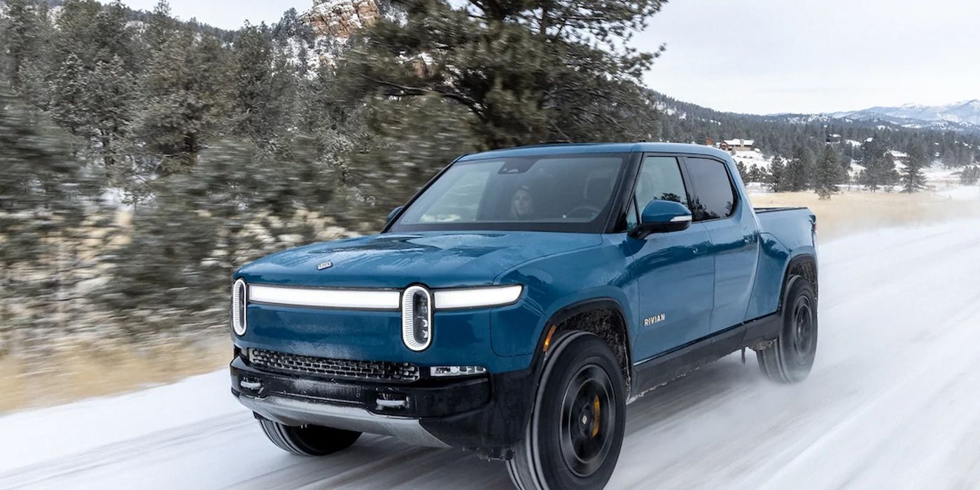 The Rivian R1T travelling on a snow-covered road