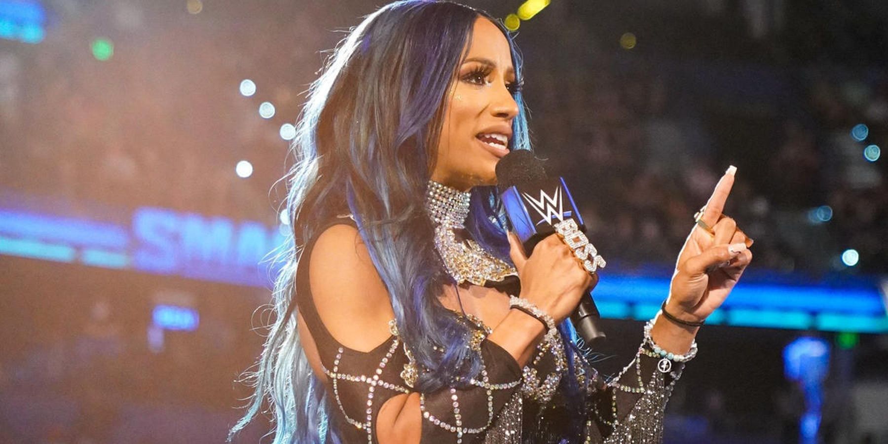 Sasha Banks cuts a promo while still working for WWE in 2022. 